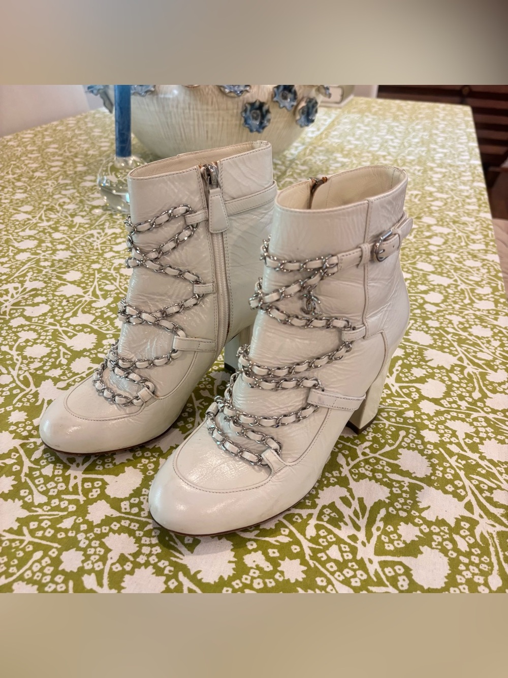 CHANEL CALFSKIN LEATHER BOOTIES WITH CHAIN DETAIL